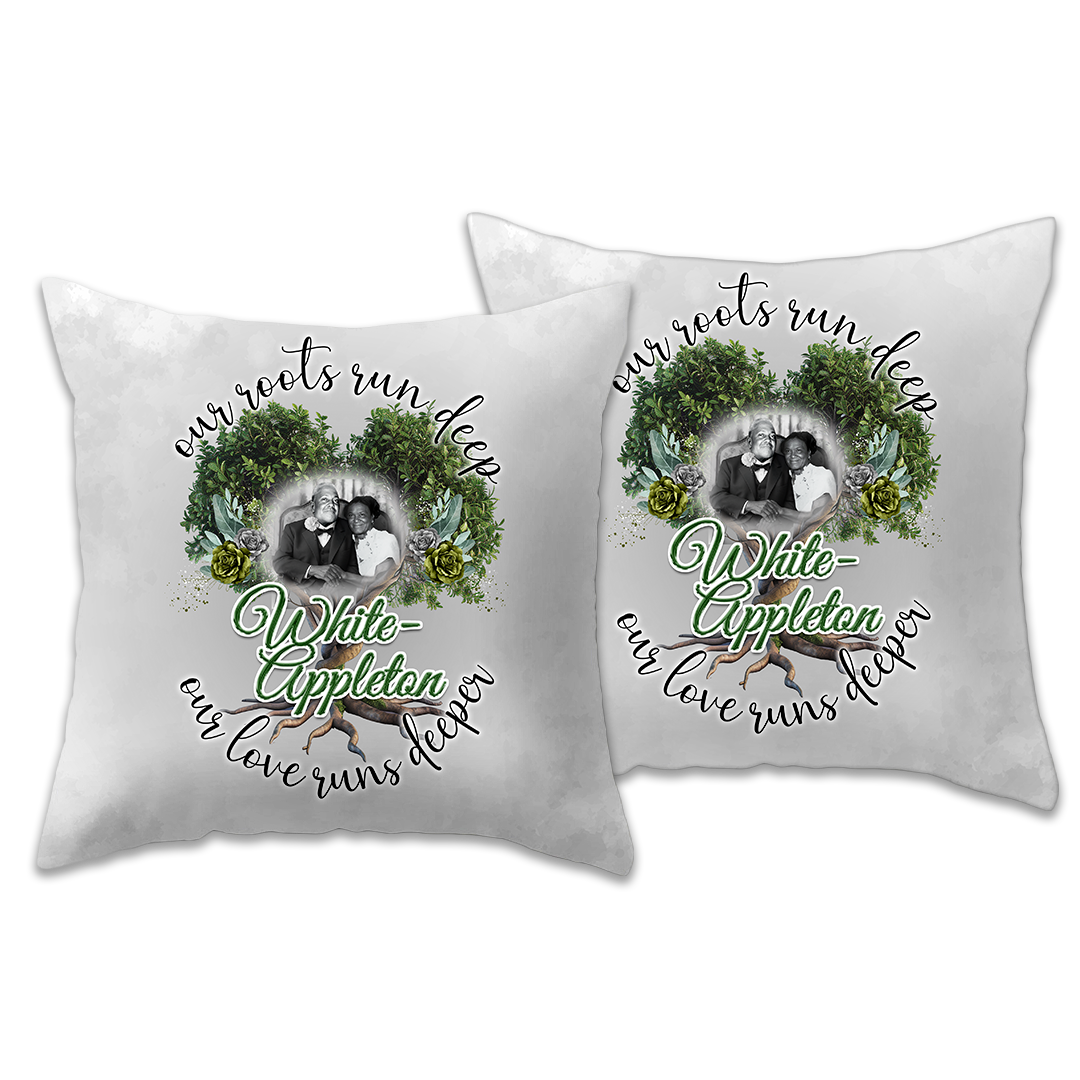 Set of light gray pillows with a printed Lineage design of a Marcellus White and Theodosha Appleton-White and text that reads, "our roots run deep, our love runs deeper
