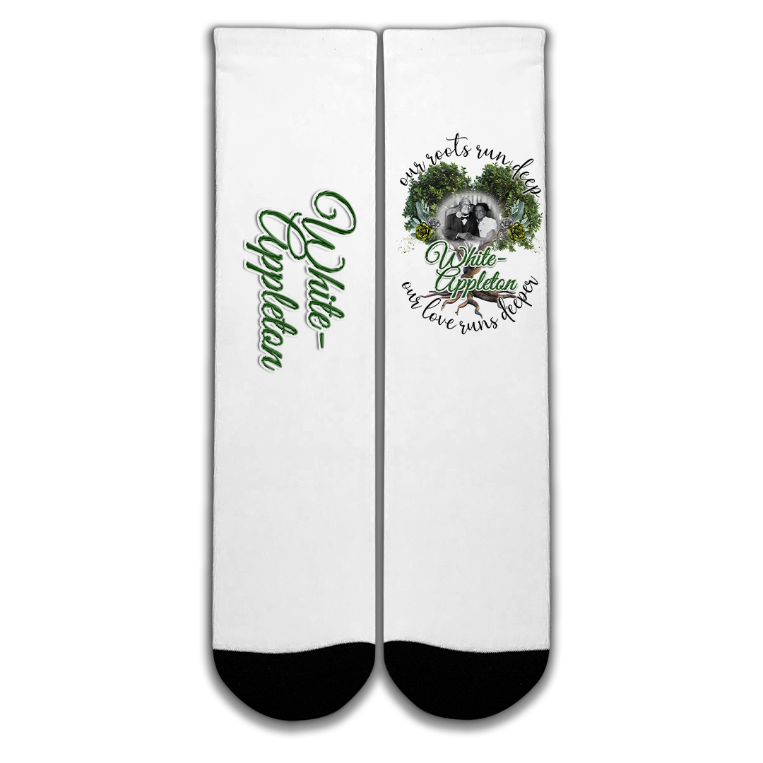 White socks with black toe and heel featuring White-Appleton lineage photo and “Our Roots Run Deep” message.